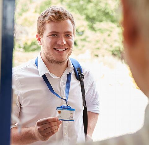 Carer showing ID at door
