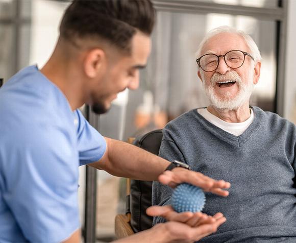 carer working with elderly man
